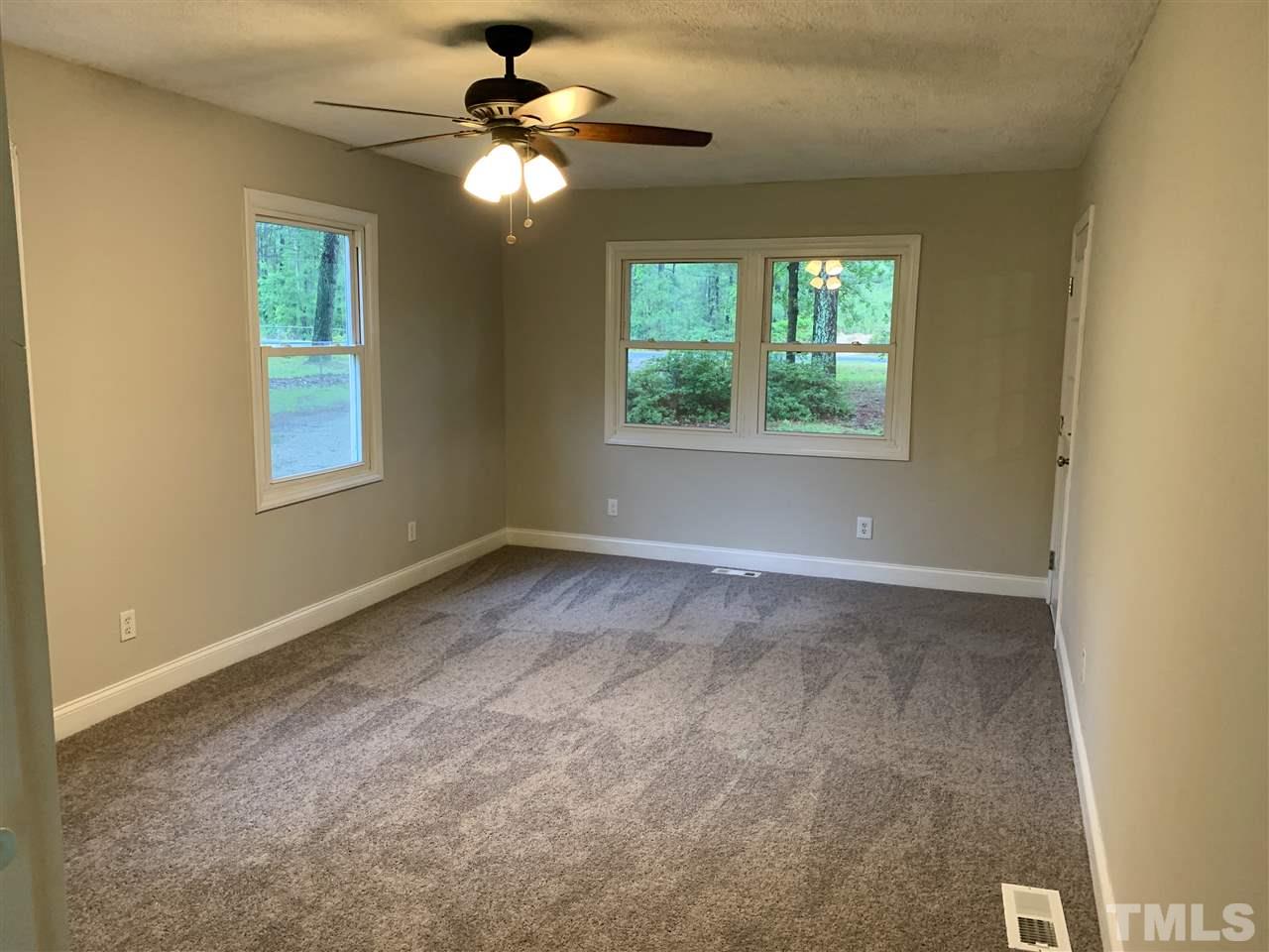 670 Anderson Road Linden, NC 28356 - Photo 5 of 16 Relax in the home's comfortable living room, the view is amazing!