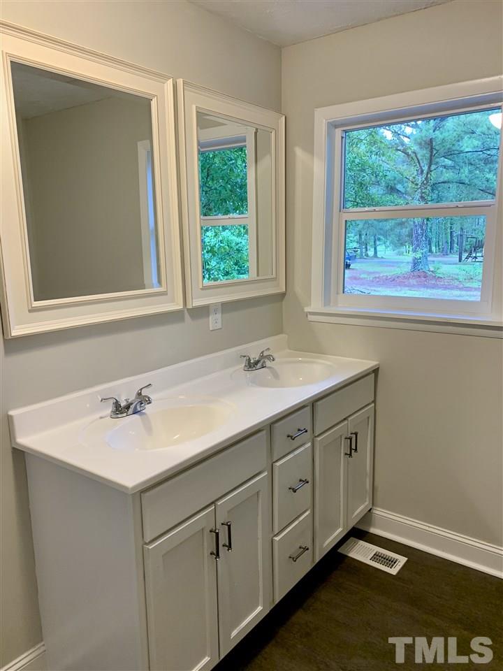 670 Anderson Road Linden, NC 28356 - Photo 8 of 16 New cabinets, new mirrors, new double vanity... wow!