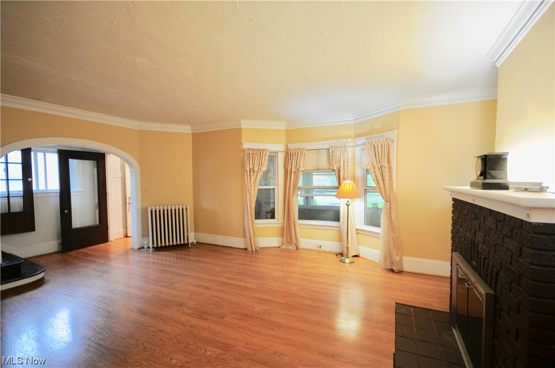 1416 Dill Road Cleveland, OH 44121 - Photo 4 of 29 Living Room overlooks the Finished Front Porch