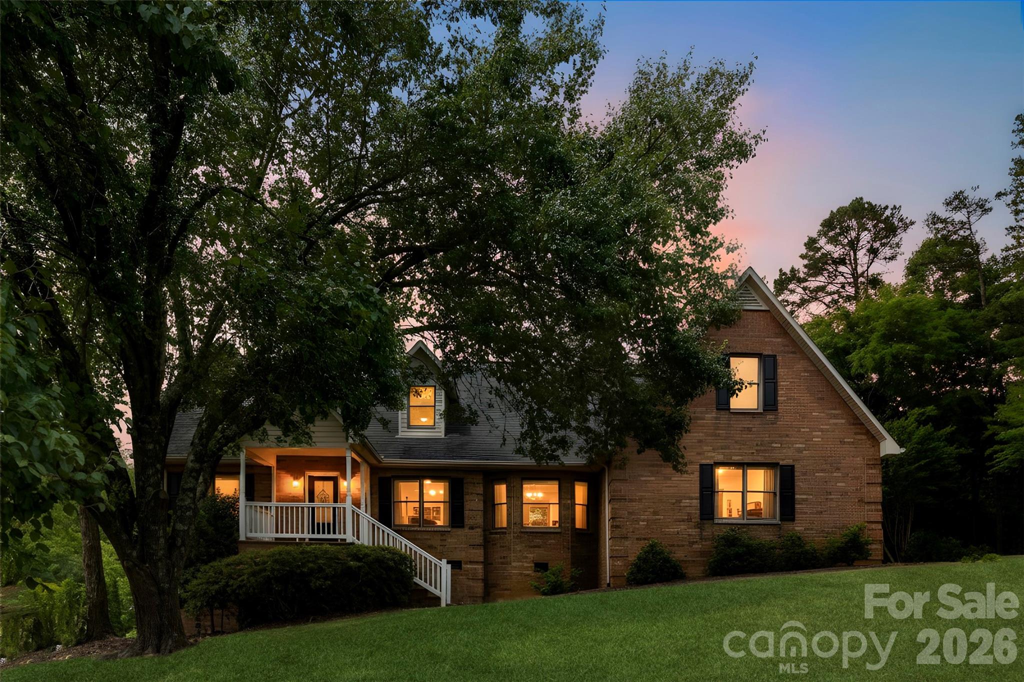 813 Rothmoor Drive Northeast Concord, NC 28025 - Photo 1 of 35 a front view of a house with a yard