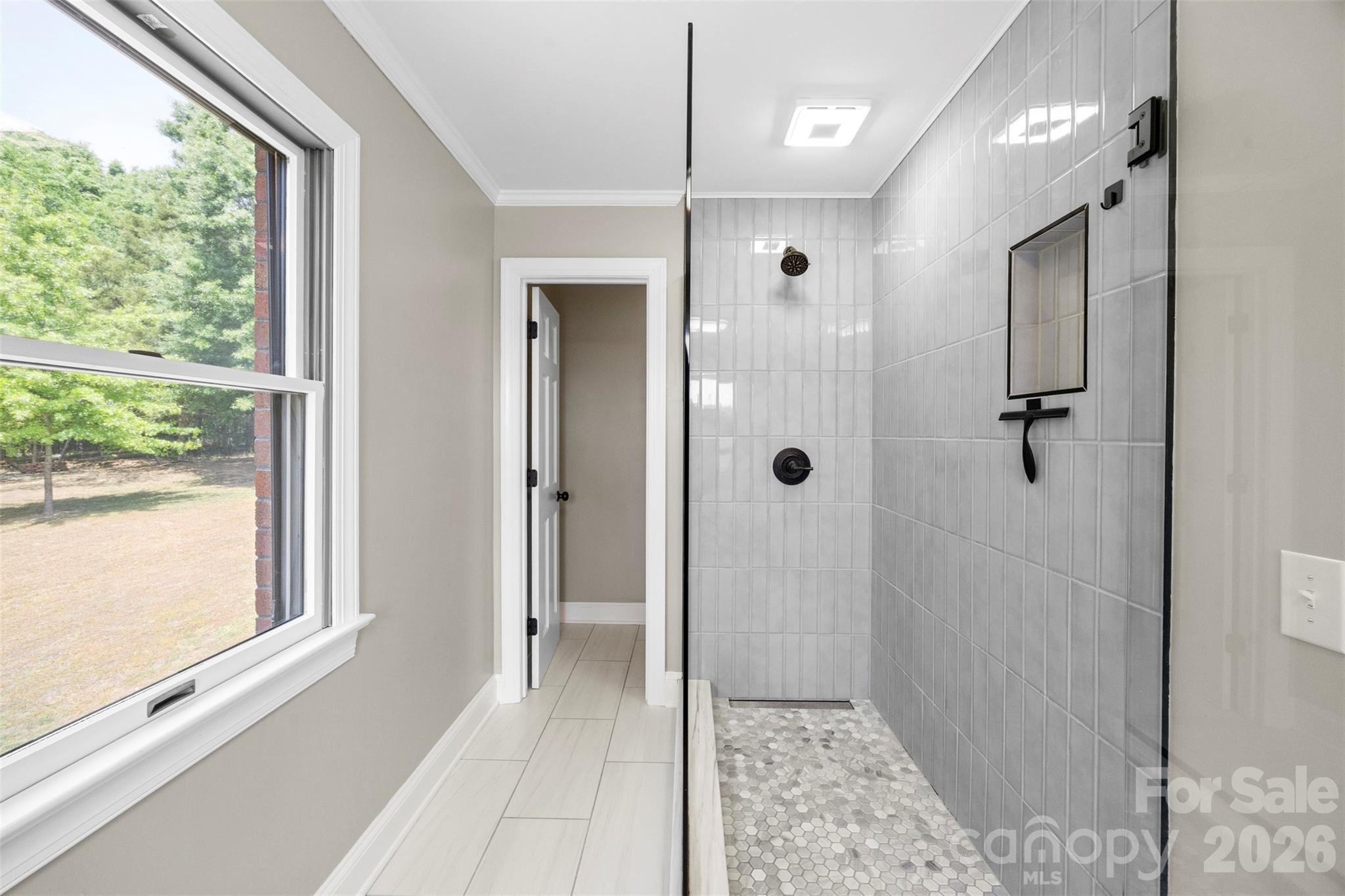 813 Rothmoor Drive Northeast Concord, NC 28025 - Photo 12 of 35 a bathroom with a shower and a sink