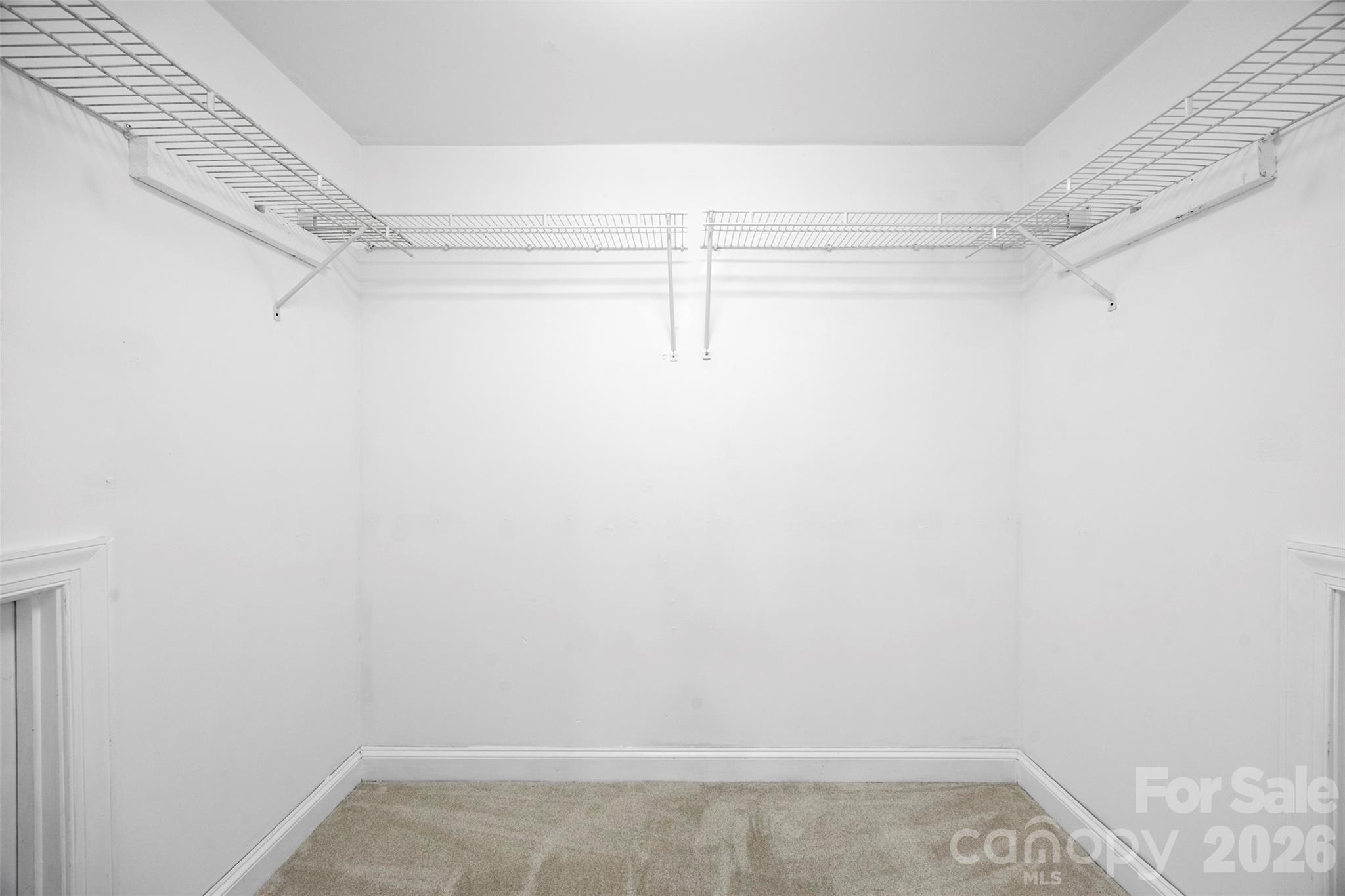 813 Rothmoor Drive Northeast Concord, NC 28025 - Photo 22 of 35 a view of a room with racks on the wall
