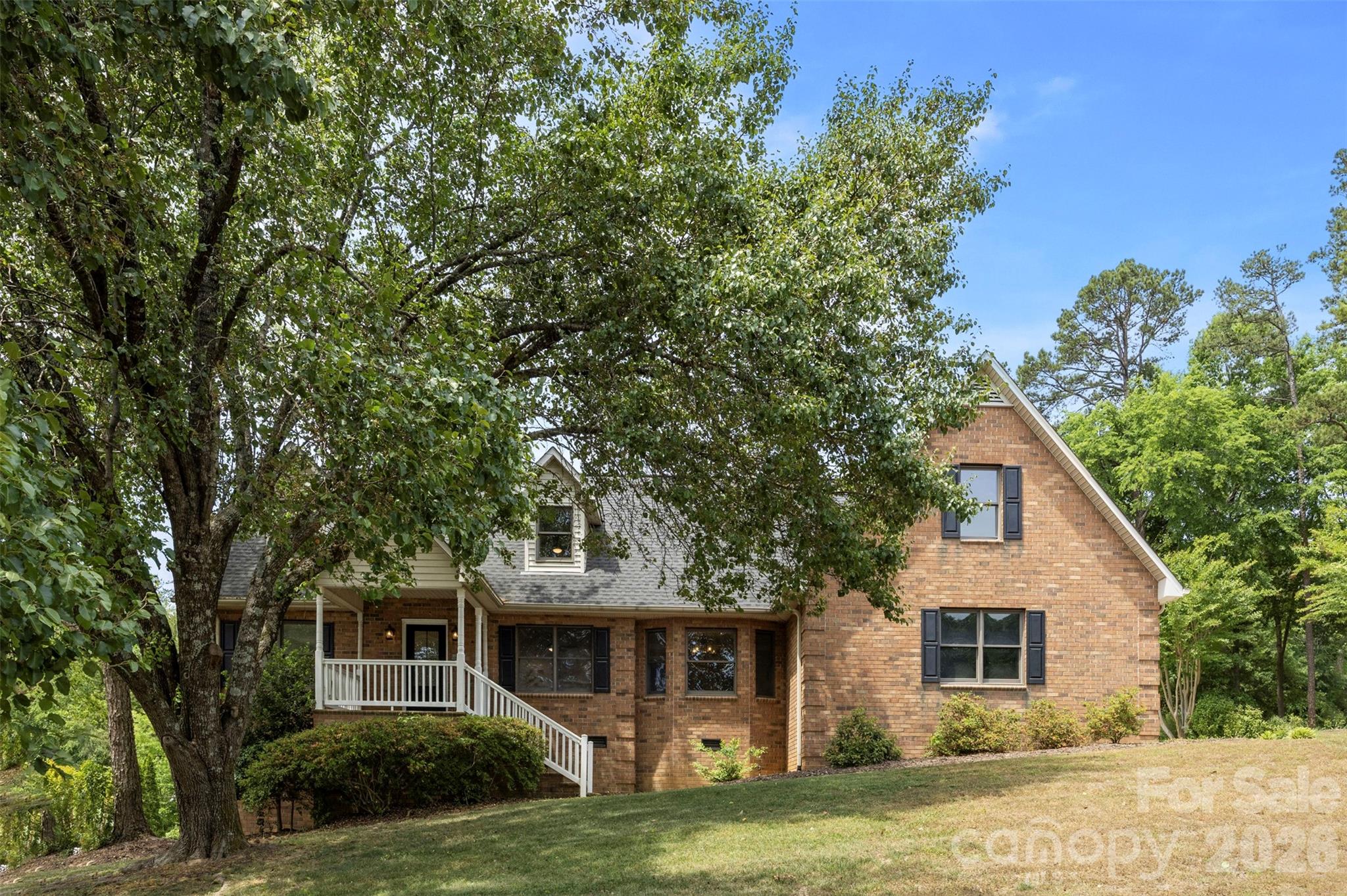 813 Rothmoor Drive Northeast Concord, NC 28025 - Photo 28 of 35 a front view of a house with a garden
