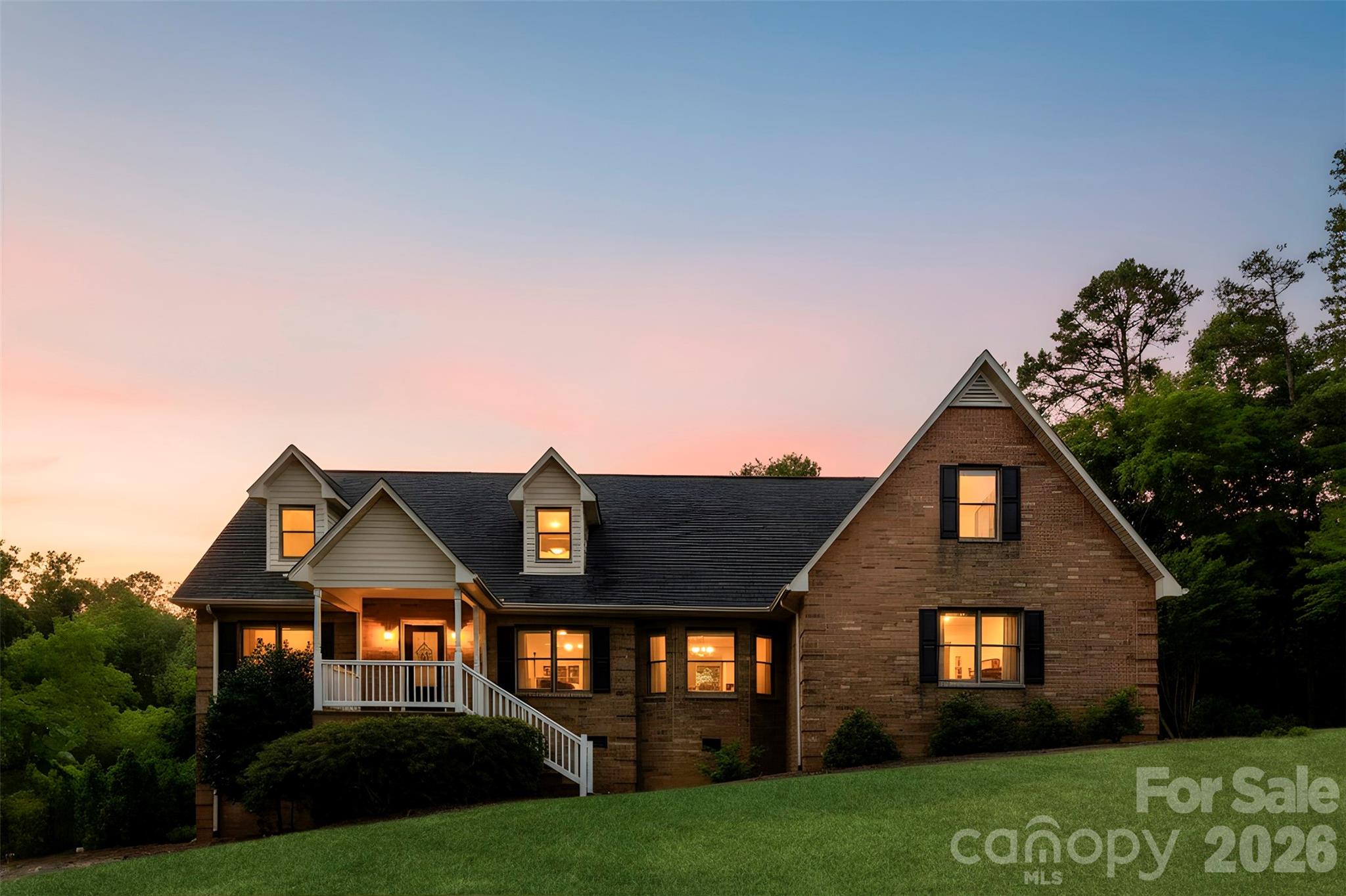 813 Rothmoor Drive Northeast Concord, NC 28025 - Photo 29 of 35 a front view of a house with a garden