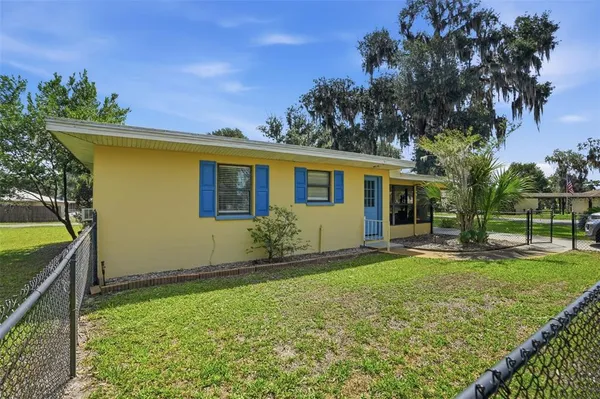 front view of house with a yard