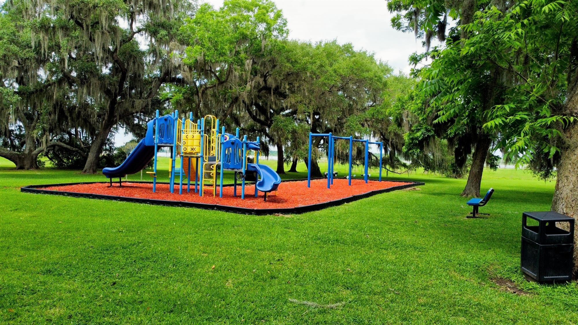 118 Pony Trail Angleton, TX 77515 - Photo 4 of 20 a view of a park with large trees