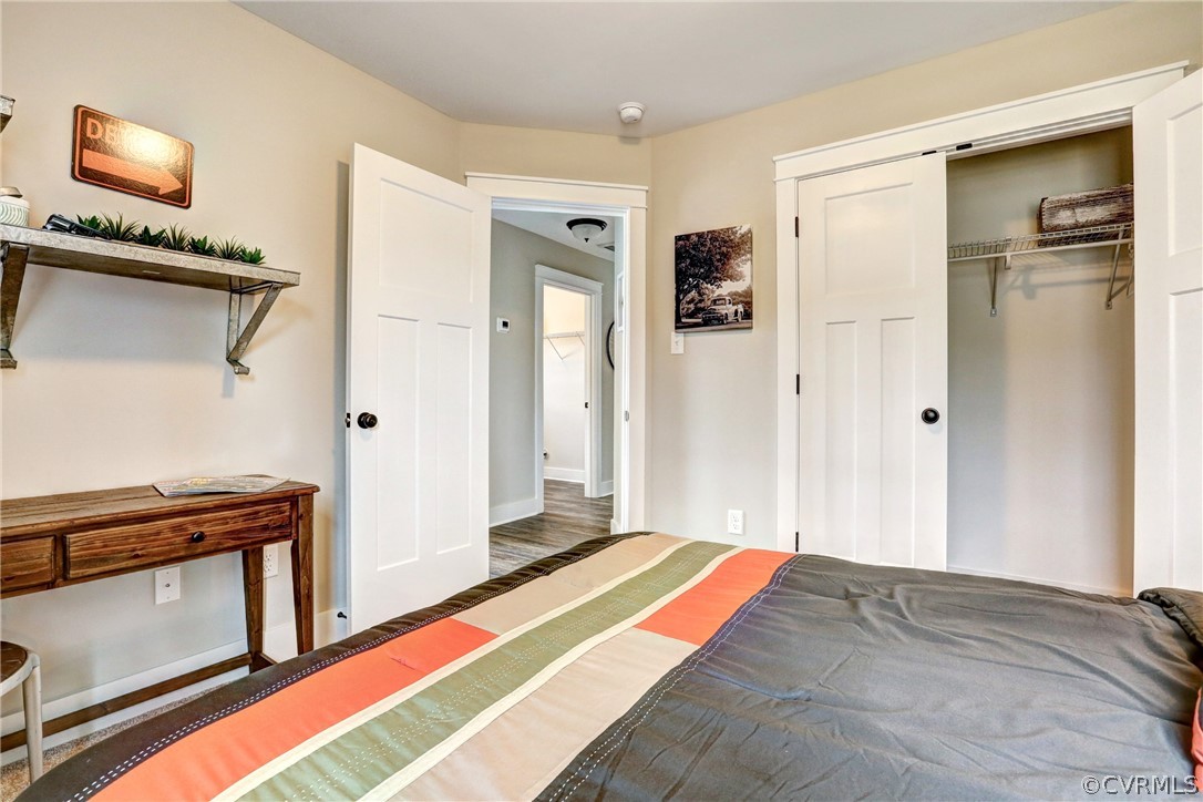 4955 Michaelwood Road Chesterfield, VA 23832 - Photo 17 of 19 a bedroom with a bed and a fireplace