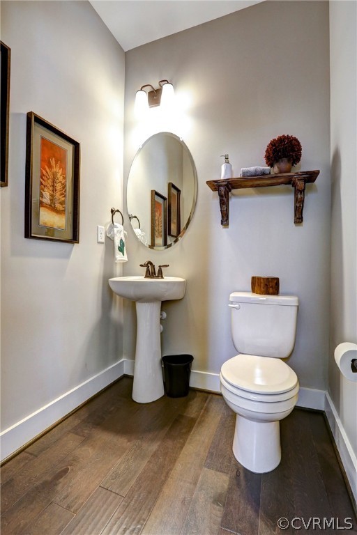 4955 Michaelwood Road Chesterfield, VA 23832 - Photo 8 of 19 a bathroom with a toilet sink and mirror