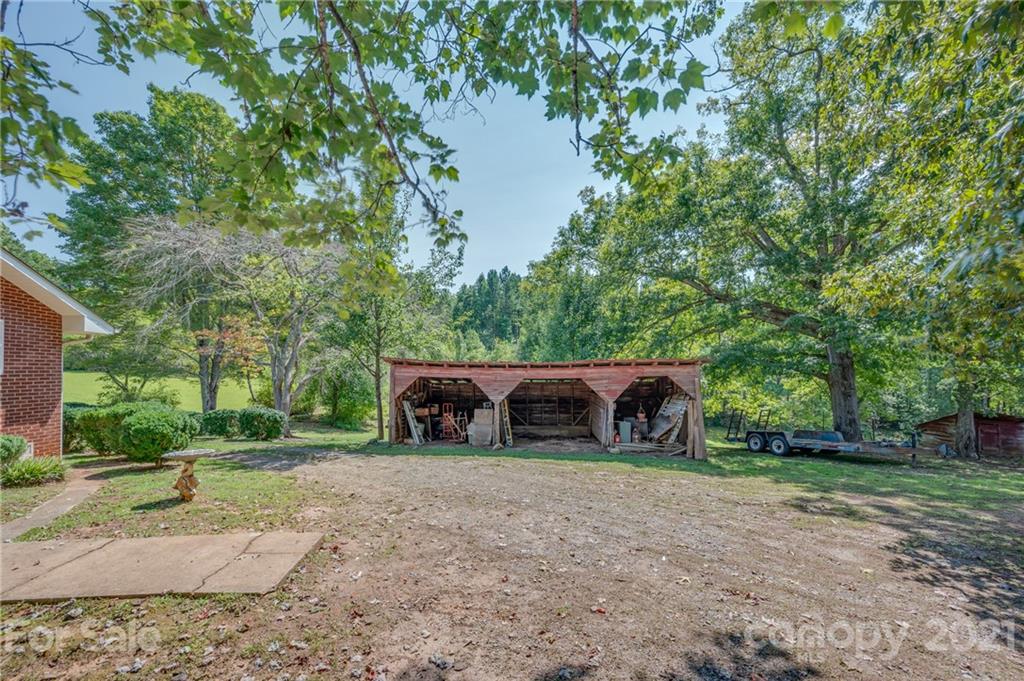 2330 Polk County Line Road Rutherfordton, NC 28139 - Photo 20 of 47 a view of a house with a yard