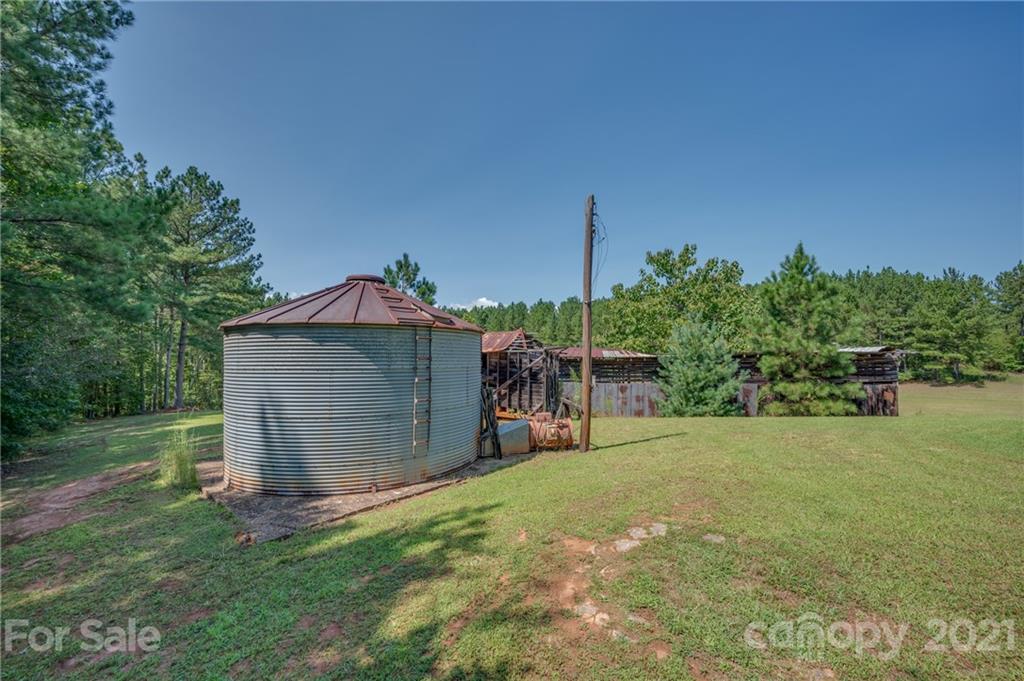 2330 Polk County Line Road Rutherfordton, NC 28139 - Photo 22 of 47 a view of a house with a yard and sitting area