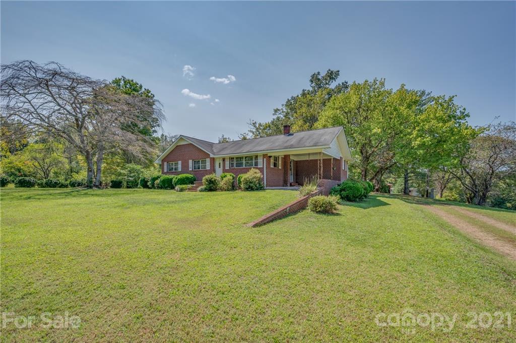 2330 Polk County Line Road Rutherfordton, NC 28139 - Photo 24 of 47 a view of a house with a yard