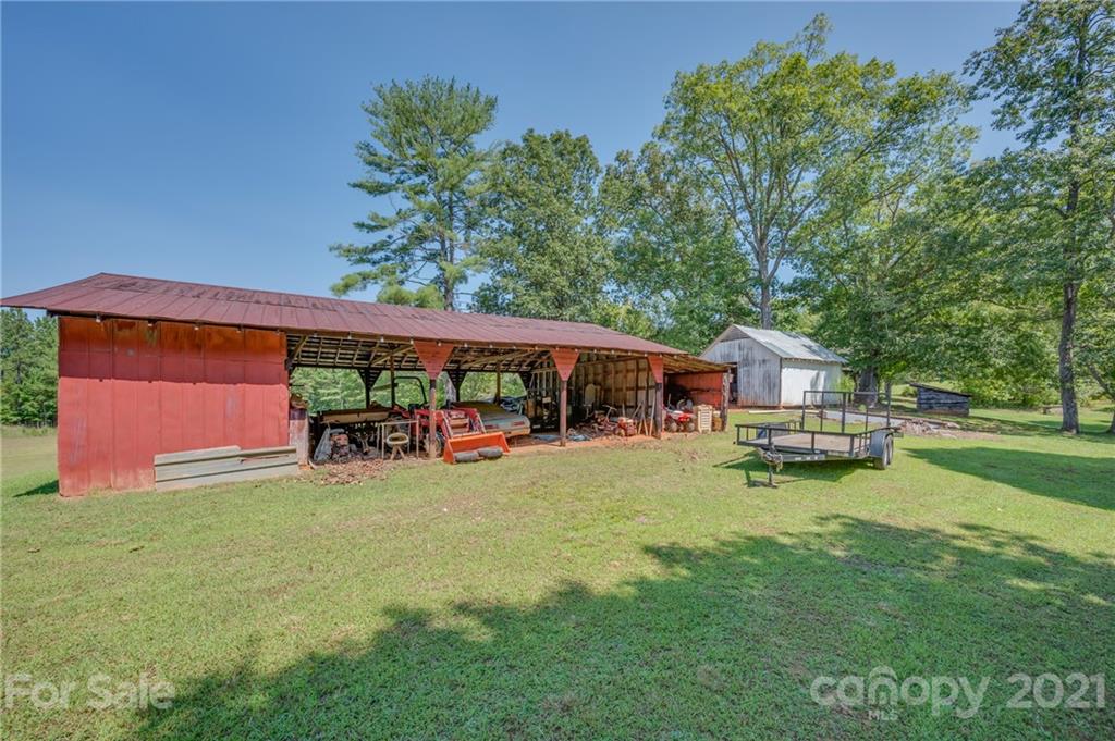 2330 Polk County Line Road Rutherfordton, NC 28139 - Photo 27 of 47 a view of a house with garden