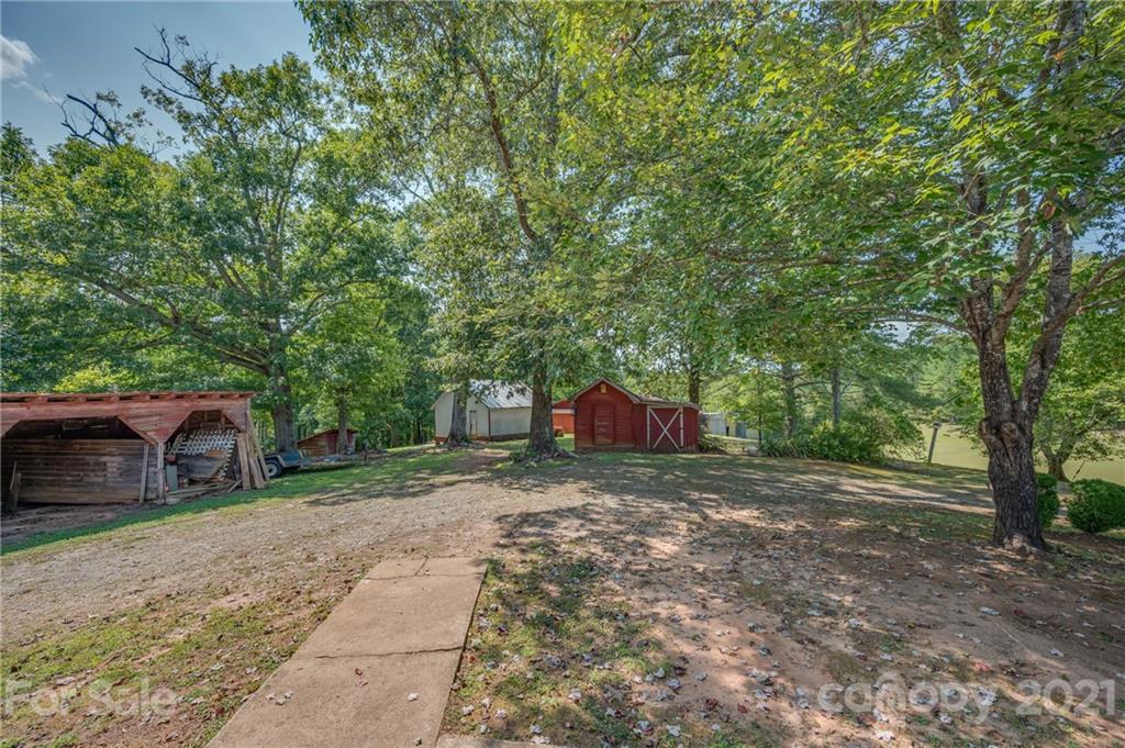 2330 Polk County Line Road Rutherfordton, NC 28139 - Photo 28 of 47 a view of a house with backyard and tree