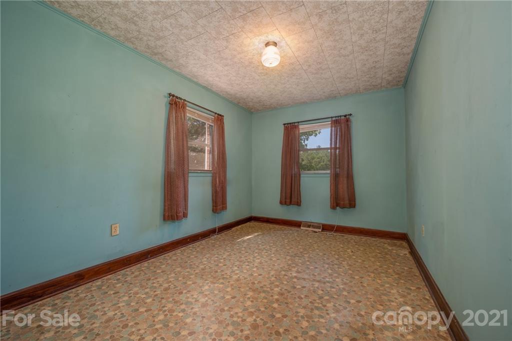 2330 Polk County Line Road Rutherfordton, NC 28139 - Photo 47 of 47 an empty room with windows