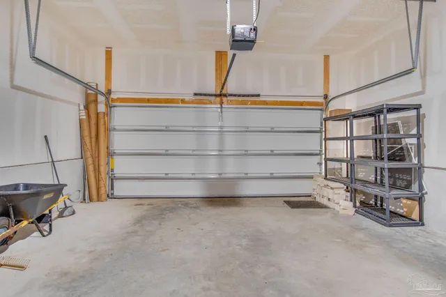 a view of an empty room with storage