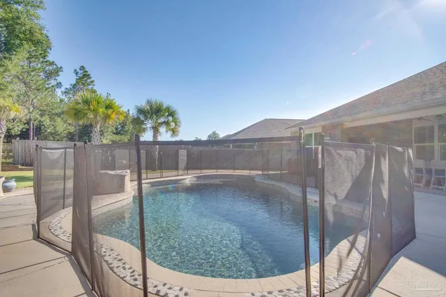 a view of backyard with green space