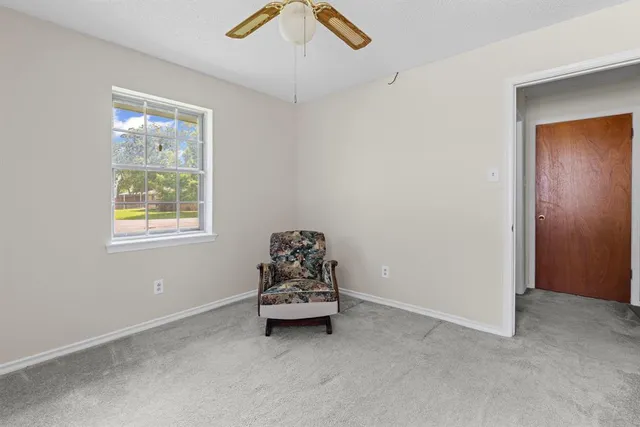 an empty room with window