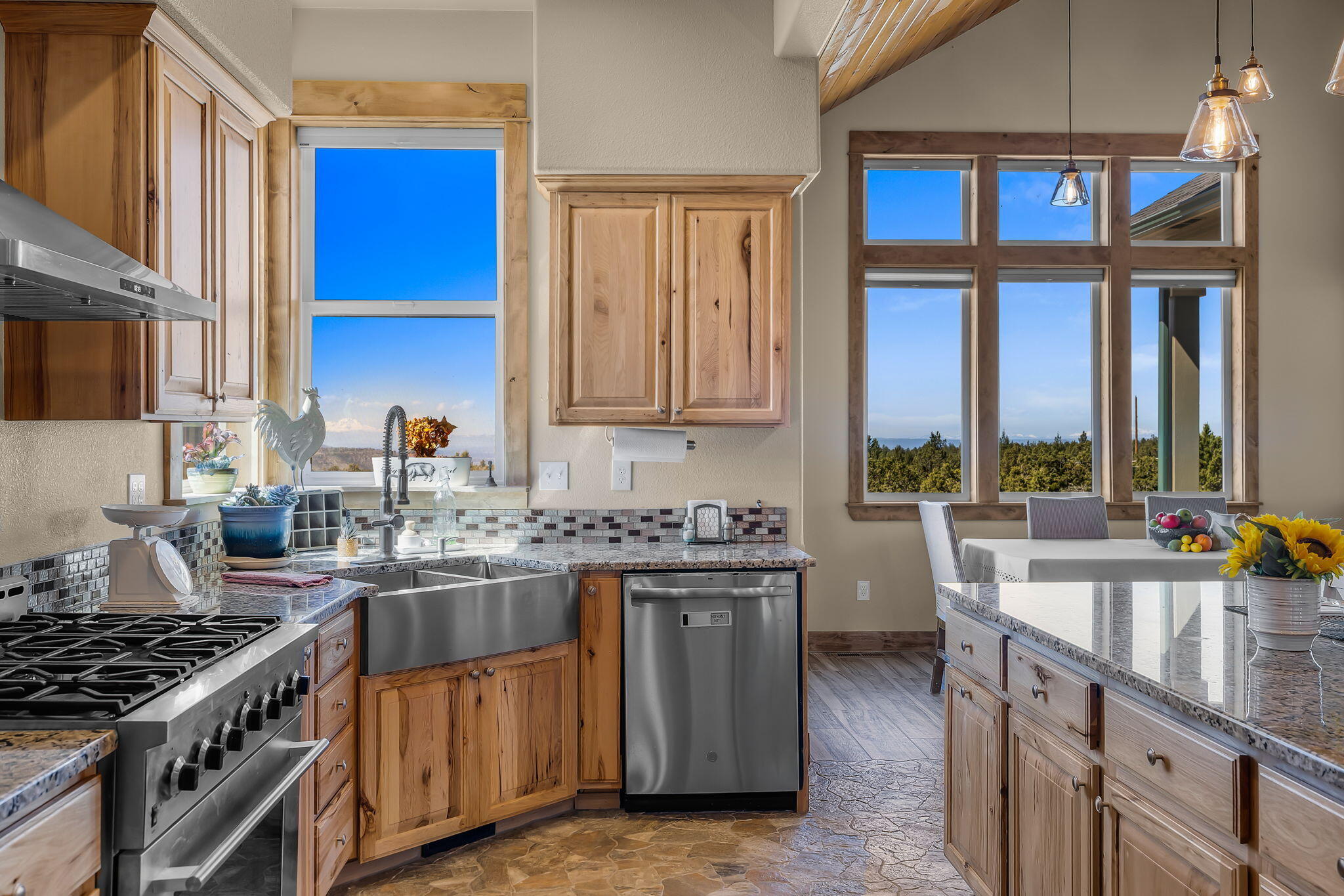 6040 Gravett Road Prineville, OR 97754 - Photo 14 of 77 a kitchen with a stove a sink and a cabinets