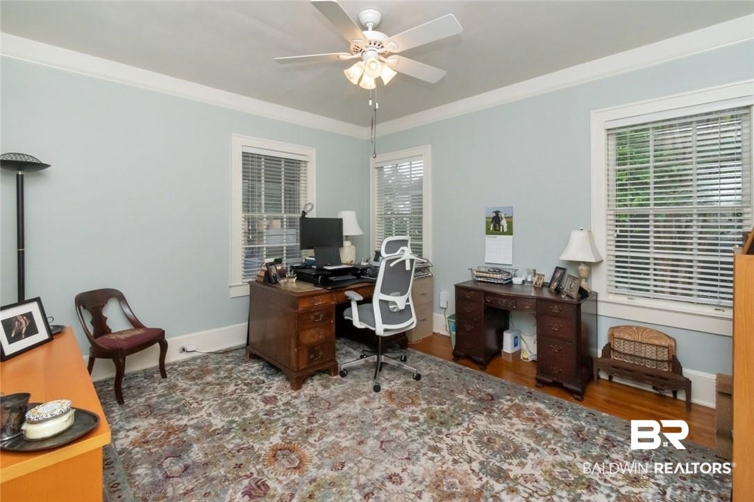128 Silverwood Street Mobile, AL 36607 - Photo 15 of 34 Office space featuring ceiling fan, crown molding, and wood-type flooring