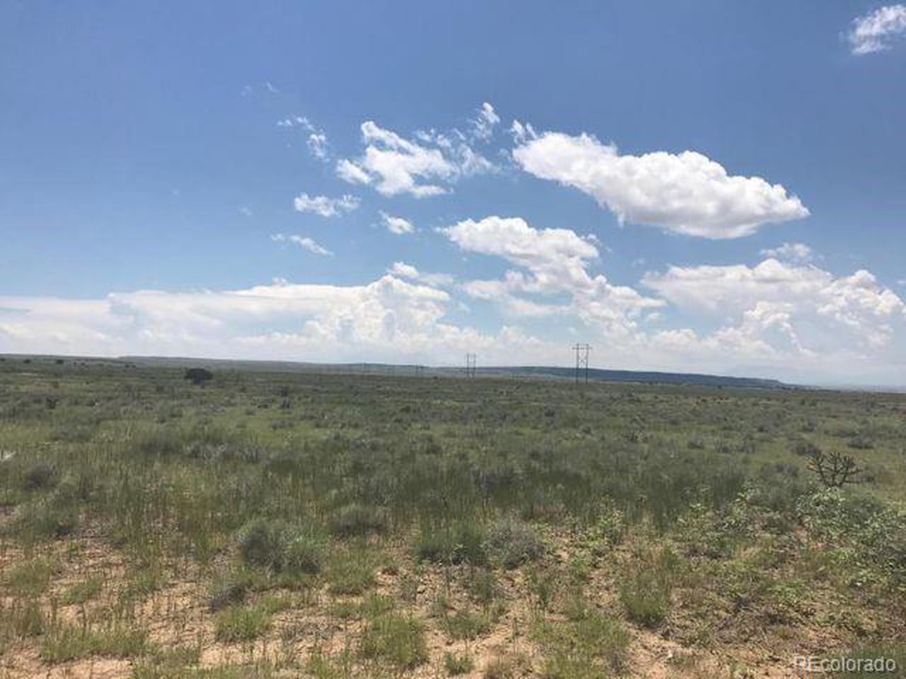 66 Turkey Ridge Road Walsenburg, CO 81089 - Photo 3 of 9 a view of city and mountain
