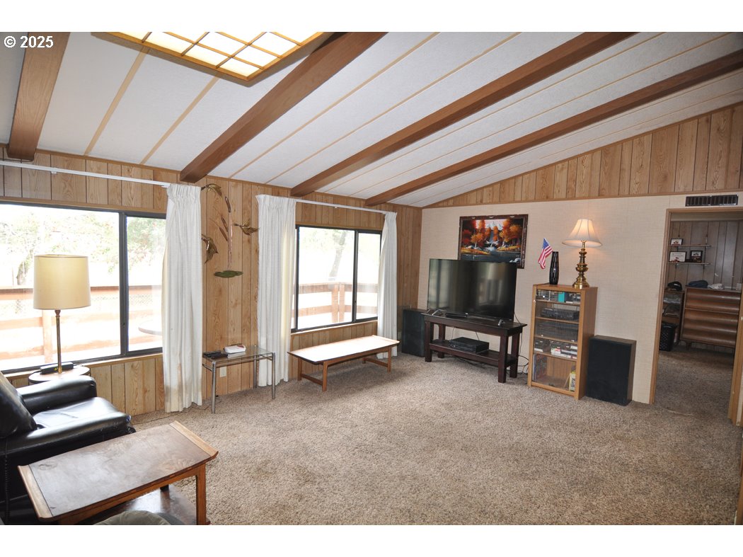 18385 South Springwater Road Estacada, OR 97023 - Photo 11 of 22 a view of a livingroom with furniture and a window