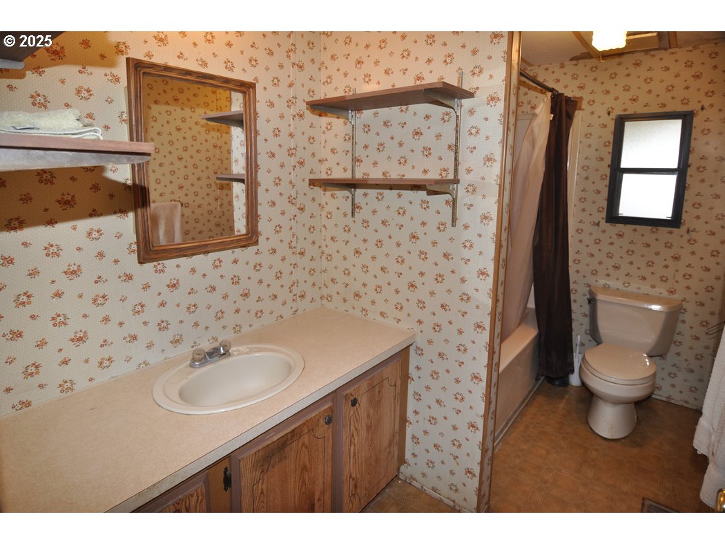 18385 South Springwater Road Estacada, OR 97023 - Photo 19 of 22 a bathroom with a sink toilet and mirror
