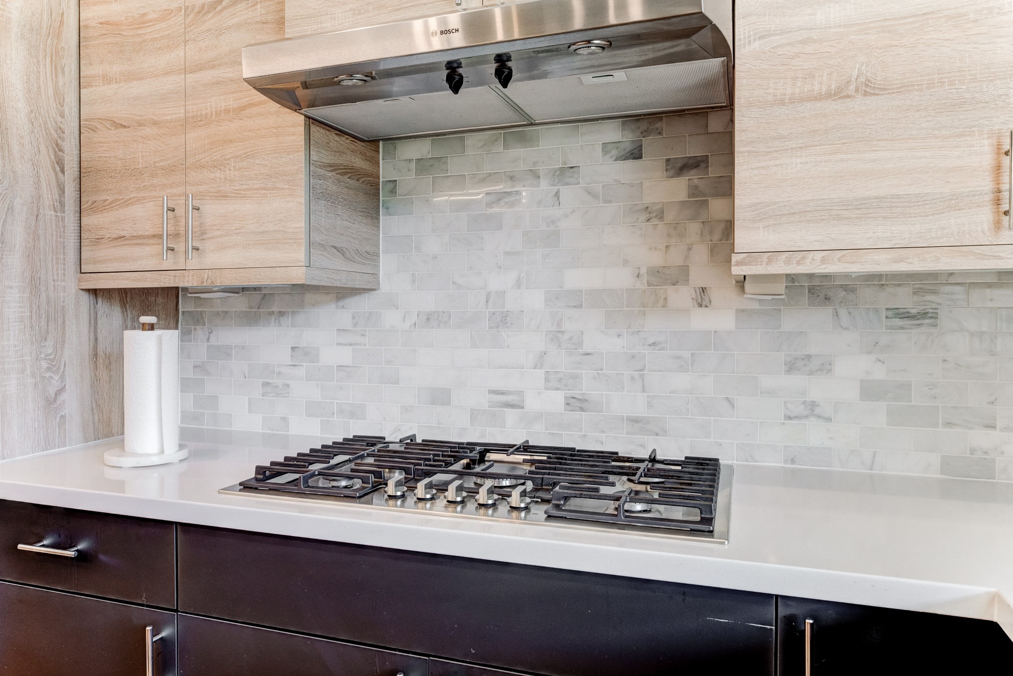 3406 Asher Landing Lane Houston, TX 77080 - Photo 12 of 45 a close view of a stove a sink and dishwasher in a kitchen