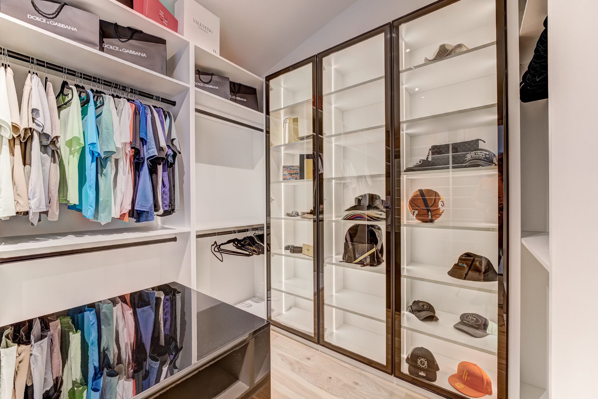 3406 Asher Landing Lane Houston, TX 77080 - Photo 21 of 45 a view of walk in closet with clothes and shoes