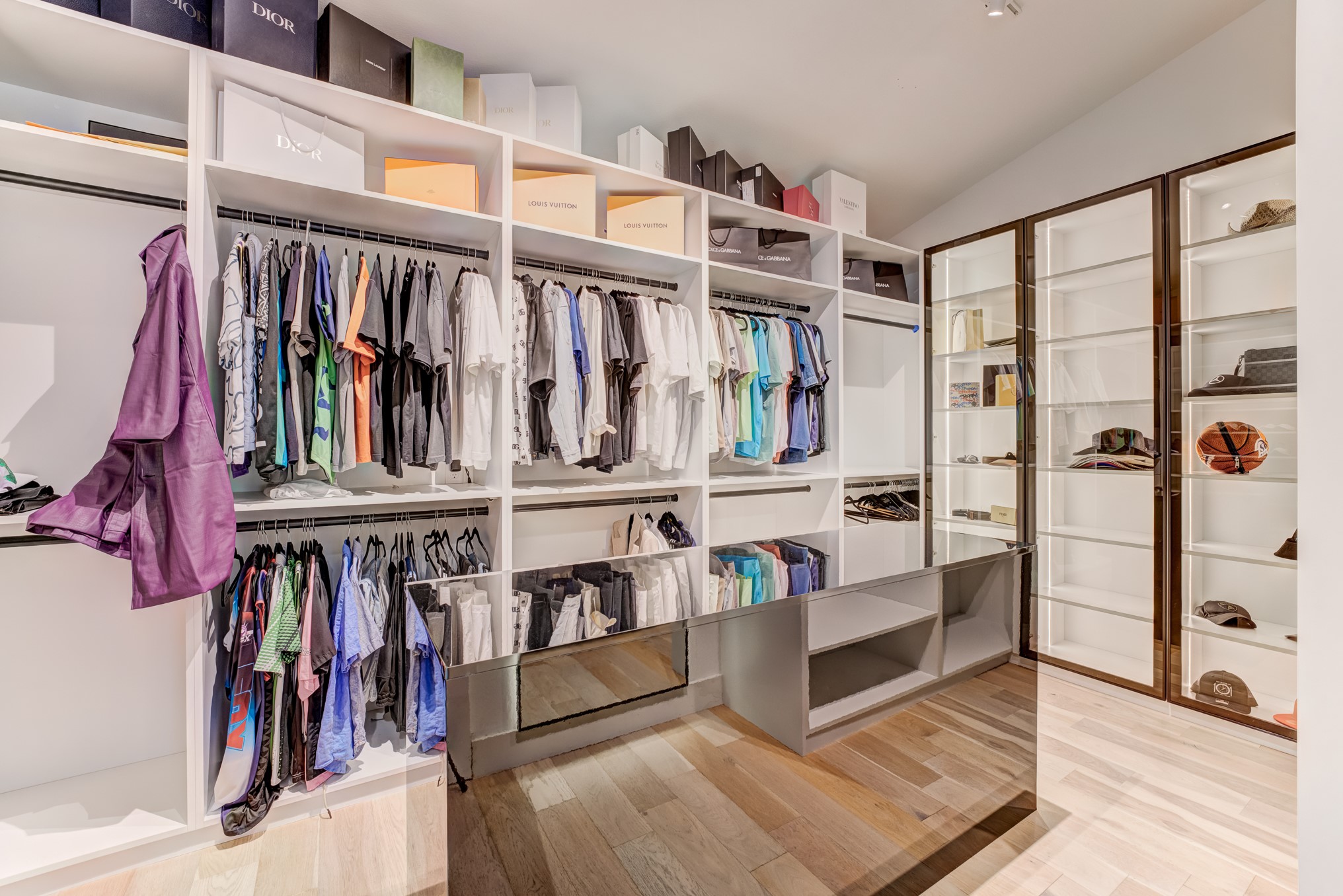 3406 Asher Landing Lane Houston, TX 77080 - Photo 22 of 45 a view of walk in closet with clothes and shoes