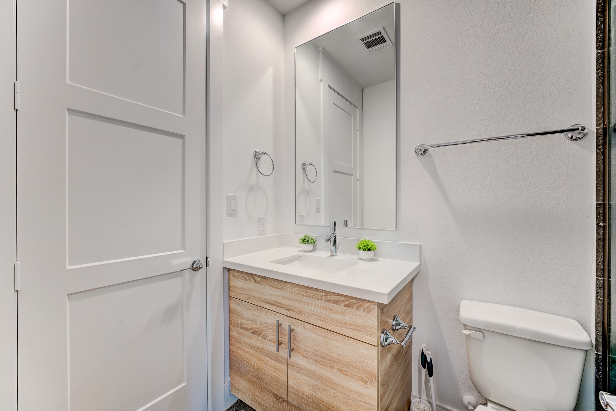3406 Asher Landing Lane Houston, TX 77080 - Photo 30 of 45 a bathroom with a sink toilet vanity and shower