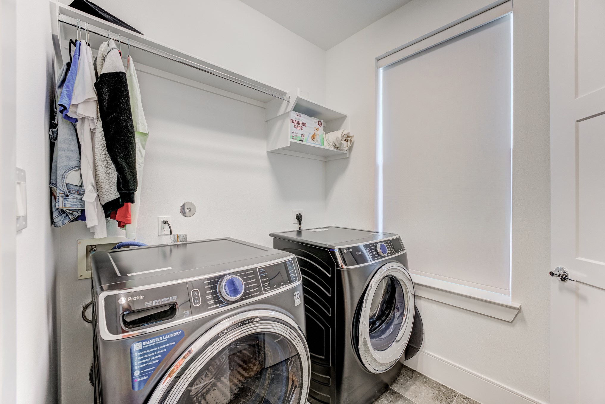 3406 Asher Landing Lane Houston, TX 77080 - Photo 31 of 45 a utility room with dryer and washer