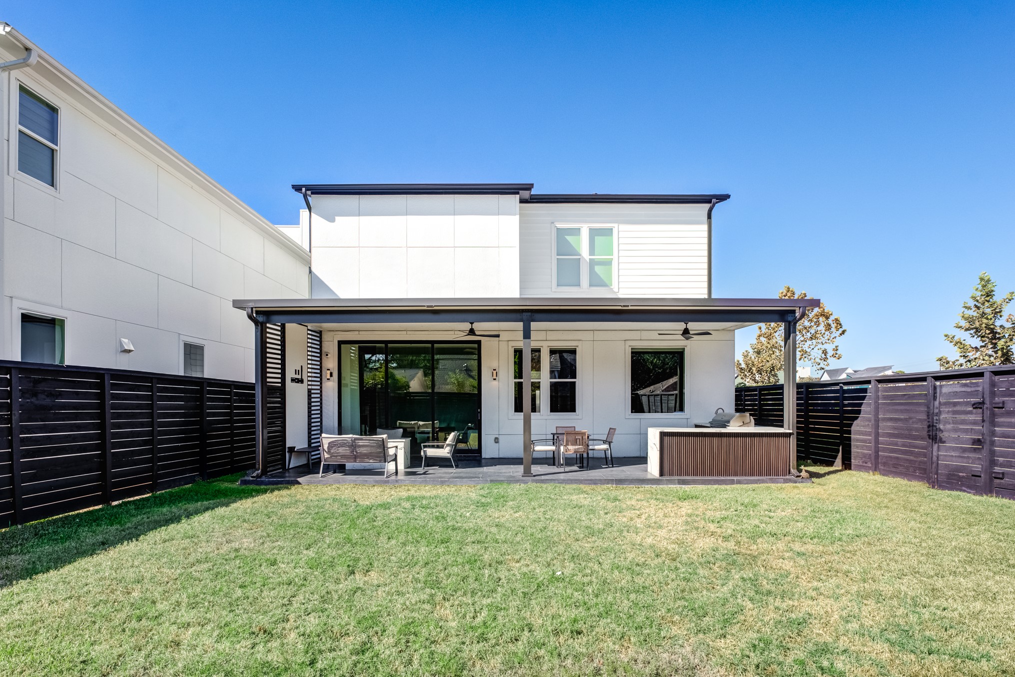 3406 Asher Landing Lane Houston, TX 77080 - Photo 32 of 45 a view of a house with backyard and porch