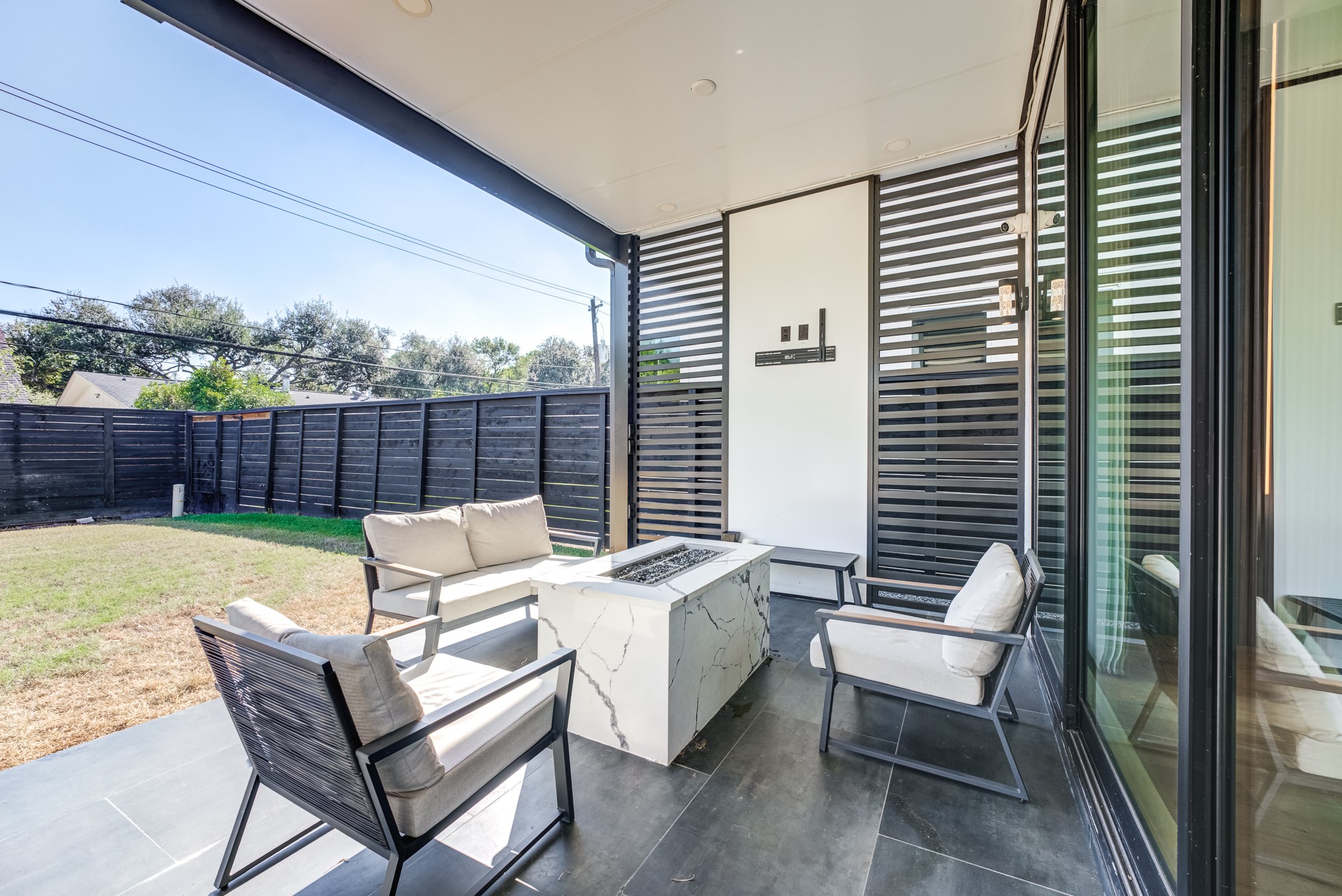 3406 Asher Landing Lane Houston, TX 77080 - Photo 35 of 45 a view of a patio with a table and chairs