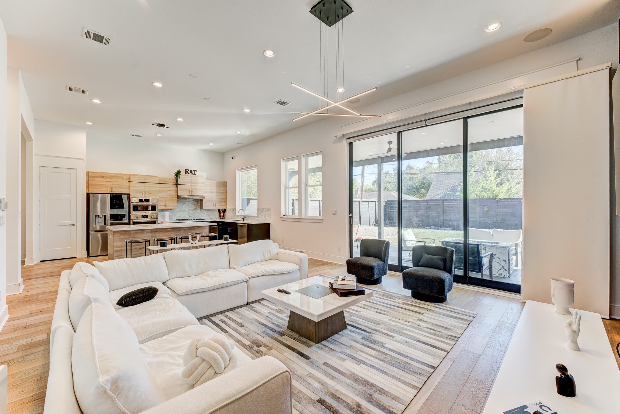 3406 Asher Landing Lane Houston, TX 77080 - Photo 5 of 45 a living room with furniture and a large window