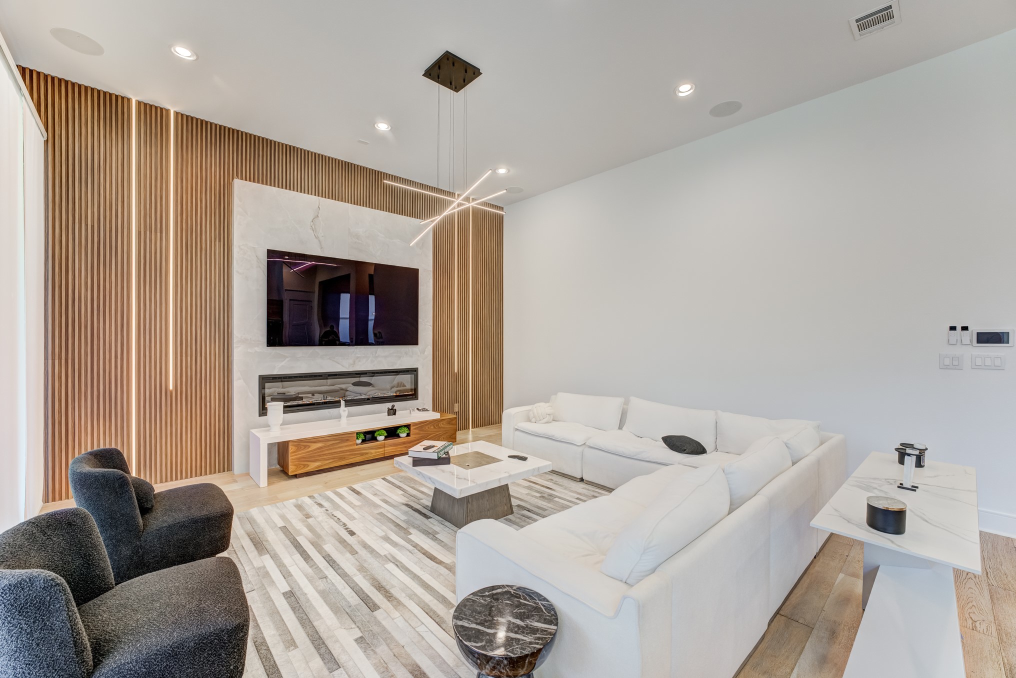 3406 Asher Landing Lane Houston, TX 77080 - Photo 8 of 45 a living room with furniture and a flat screen tv