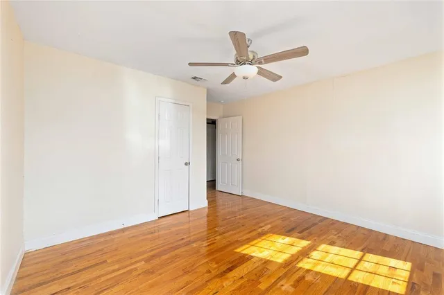 a view of a big room with wooden floor