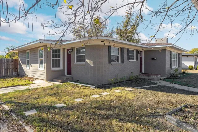 a view of a house with snow on the background