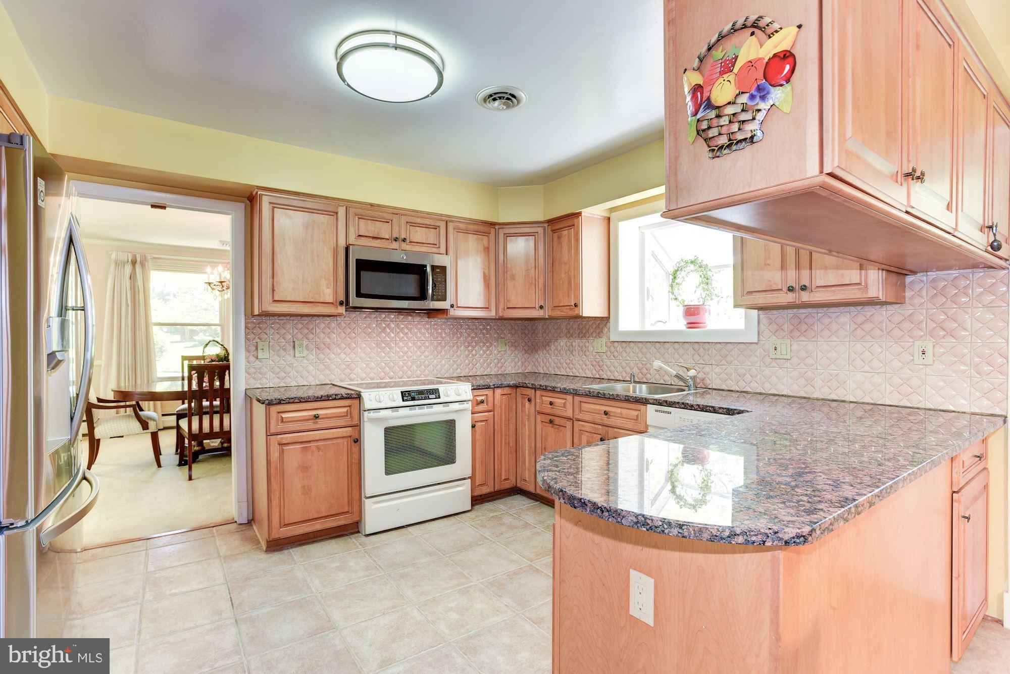 28 Millstone Road Randallstown, MD 21133 - Photo 12 of 45 Eat-In Kitchen | Granite Countertops