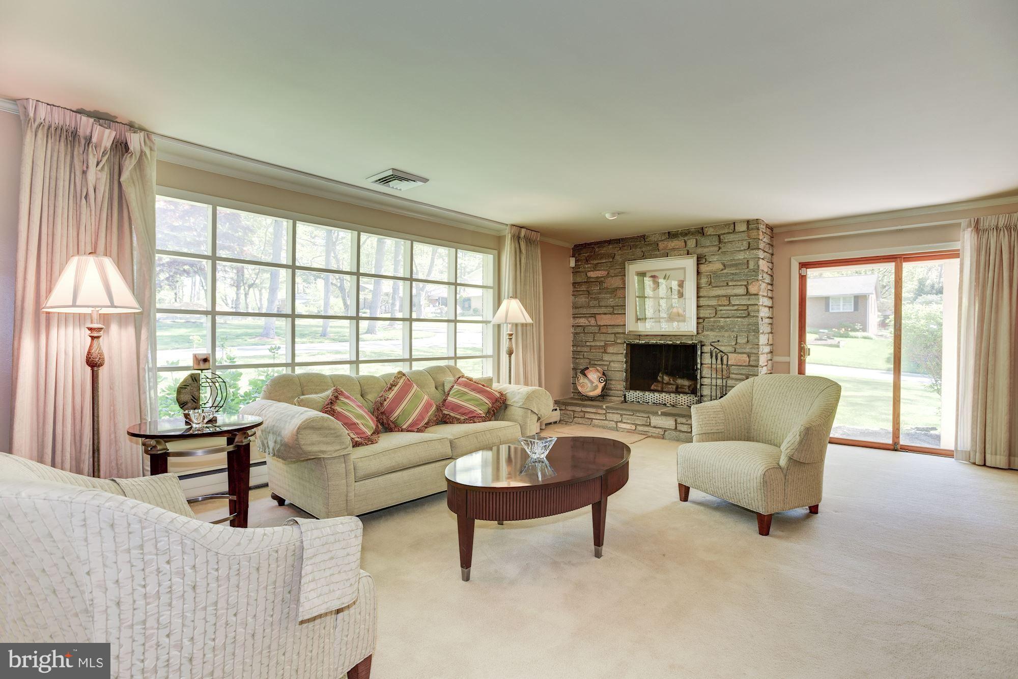 28 Millstone Road Randallstown, MD 21133 - Photo 5 of 45 Living Room | Expansive Windows | Covered Patio