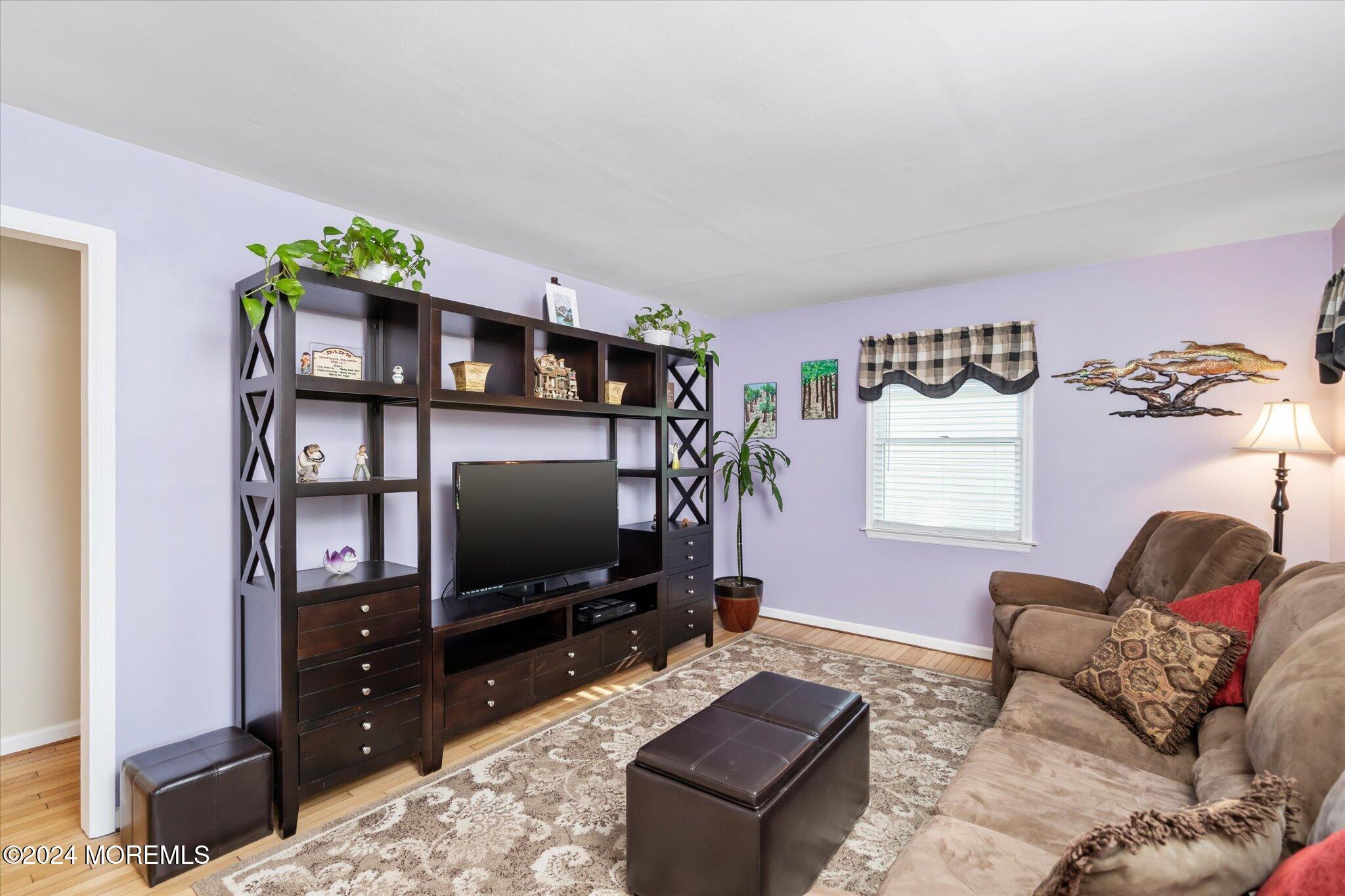 38 Waldron Road Allentown, NJ 08501 - Photo 4 of 43 a living room with furniture and a flat screen tv
