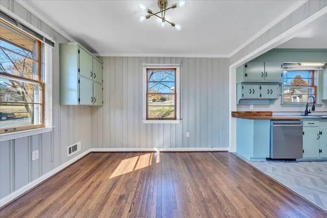 a room with window and wooden floor