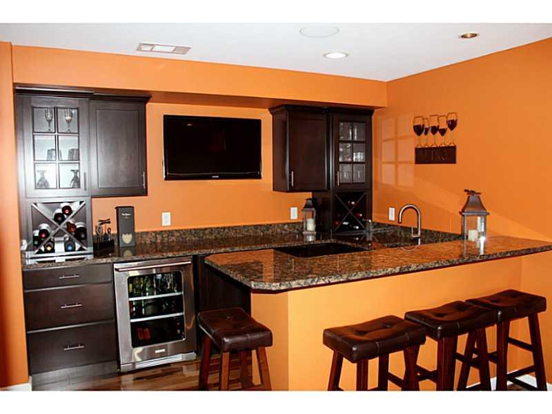 5022 Venice Road Pittsburgh, PA 15209 - Photo 18 of 25 Basement/Game Room. The finished lower level includes a full bar with granite counter tops.