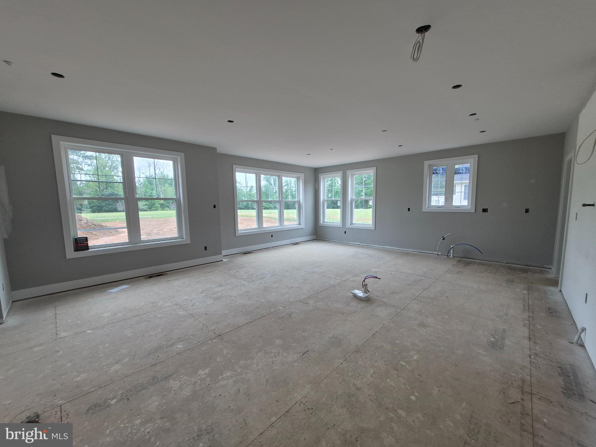 324 Bishop Hollow Road Newtown Square, PA 19073 - Photo 6 of 37 a view of an empty room with a window