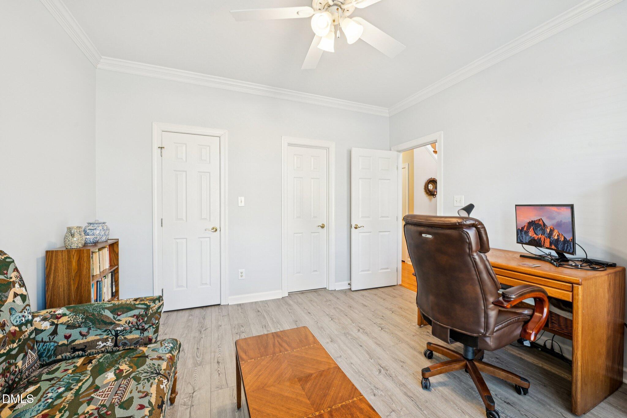200 Ridge Creek Drive Morrisville, NC 27560 - Photo 18 of 38 a workspace with furniture and wooden floor