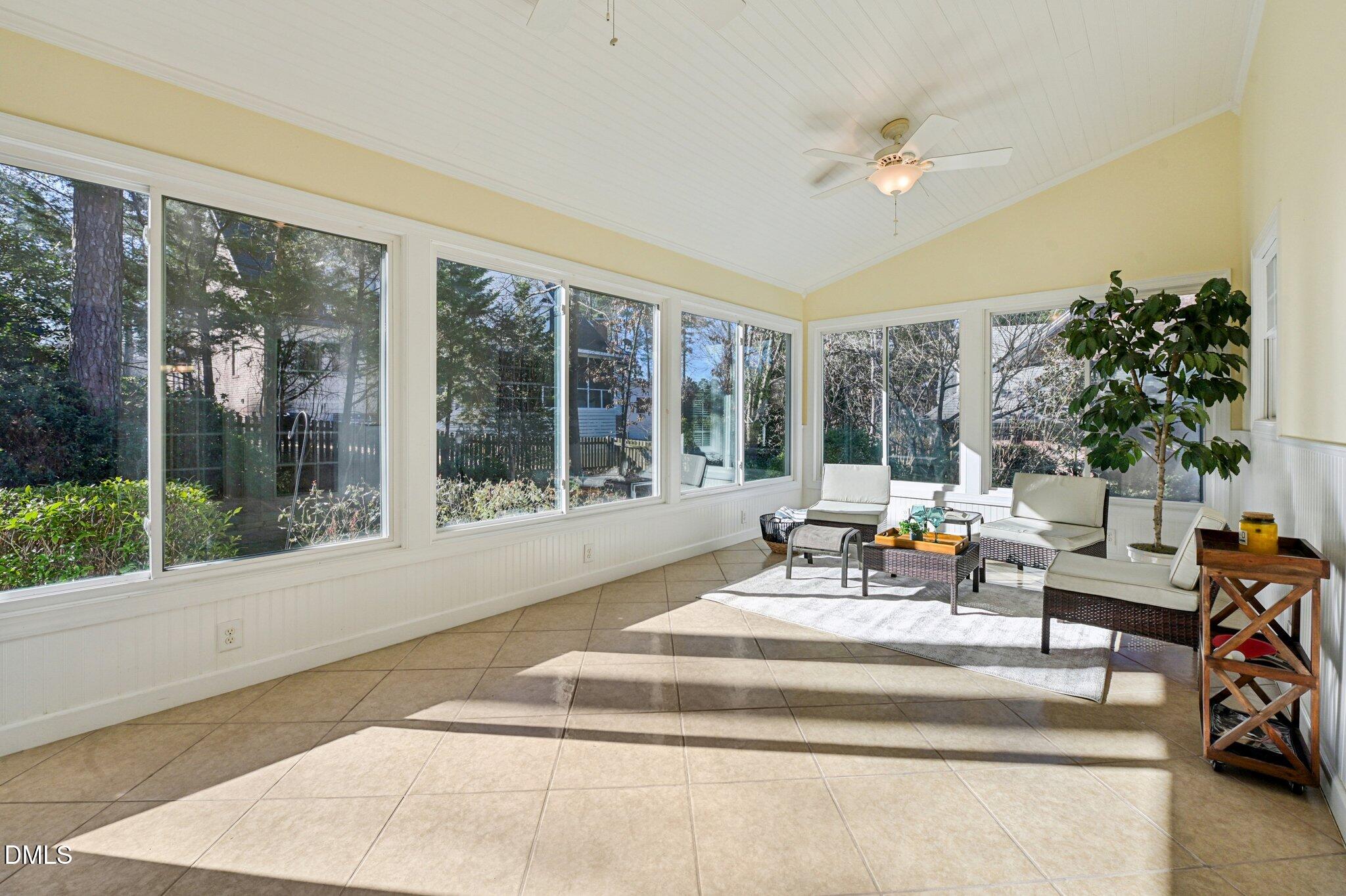 200 Ridge Creek Drive Morrisville, NC 27560 - Photo 32 of 38 a living room with furniture and a large window