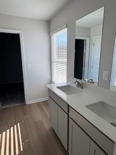202 Wildflower Circle Calhoun, GA 30701 - Photo 30 of 41 a bathroom with a sink a vanity and a mirror