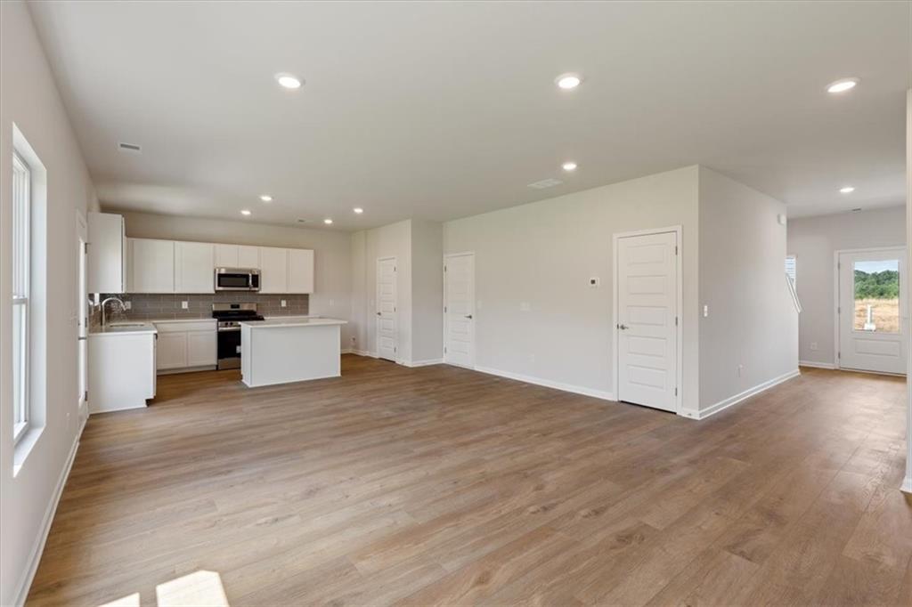 202 Wildflower Circle Calhoun, GA 30701 - Photo 6 of 41 a view of kitchen with wooden floor