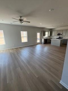 202 Wildflower Circle Calhoun, GA 30701 - Photo 8 of 41 a view of empty room with wooden floor and fan