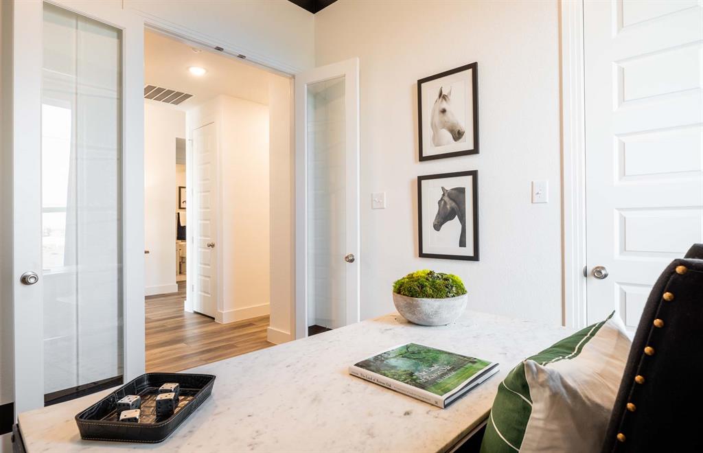 1222 Abbeygreen Road Forney, TX 75126 - Photo 22 of 29 a living room with furniture and a table