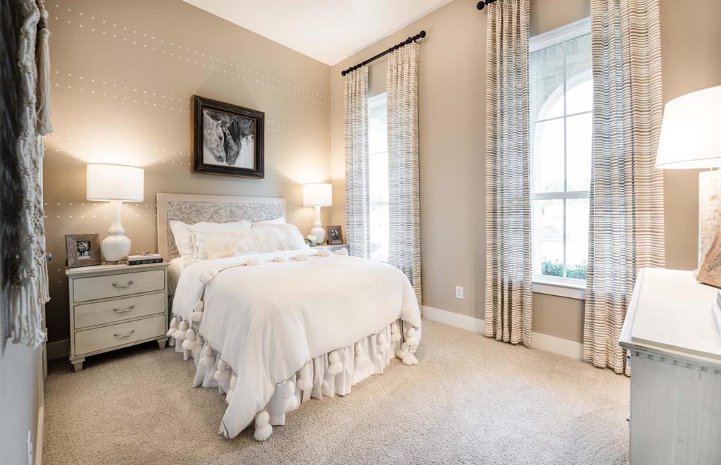 1222 Abbeygreen Road Forney, TX 75126 - Photo 23 of 29 a bed room with a bed and a night stand